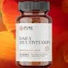 Bottle of Daily Multivitamin against a flower.